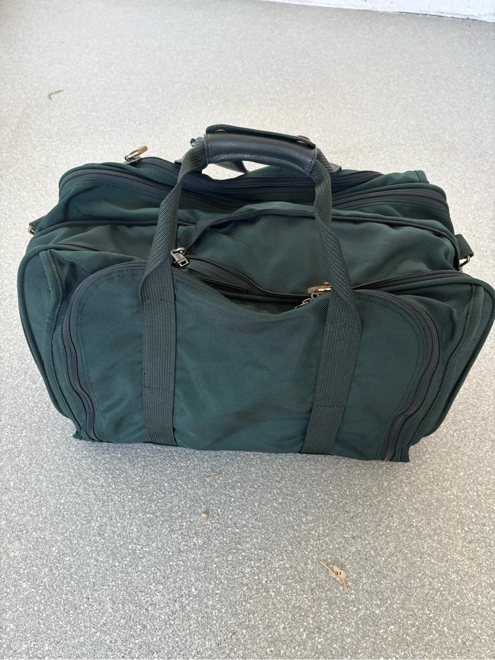 TUMI double expansion carry on travel bag, 22”wide, 10”deep, 15”tall with locks
